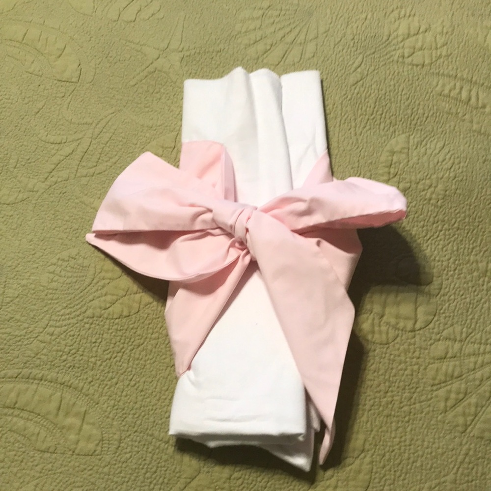 Beaufort Bonnet newborn swaddle with pink bow